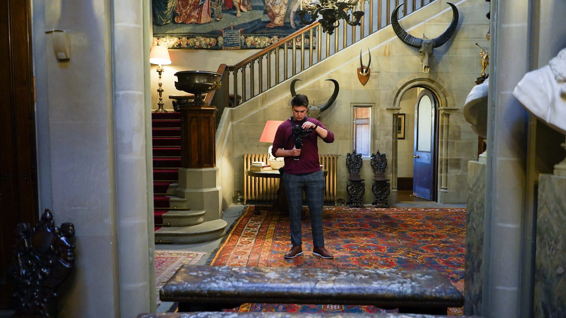 Louis with camera in countryside